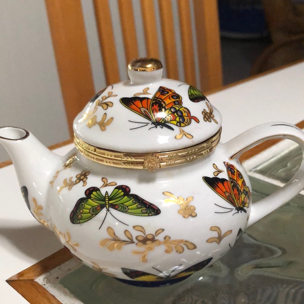 Beautiful “teapot”-really a “ catch all” for tea, bags, packets of sugar, etc.